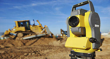 Surveyor equipment at construction site